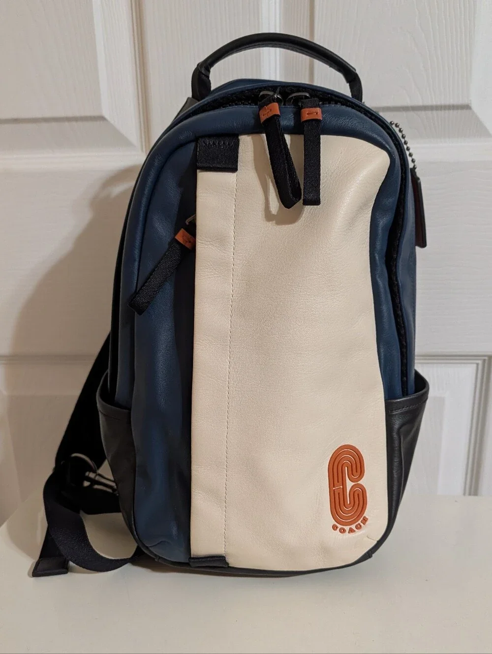 like new Coach mini backpack sling bag